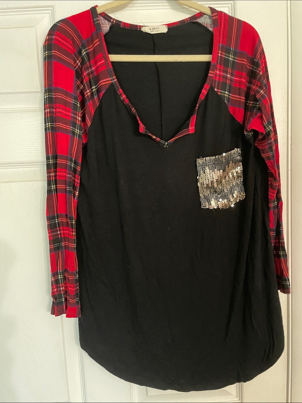 Black Top with Red Plaid Sleeves and Sequin Pocket